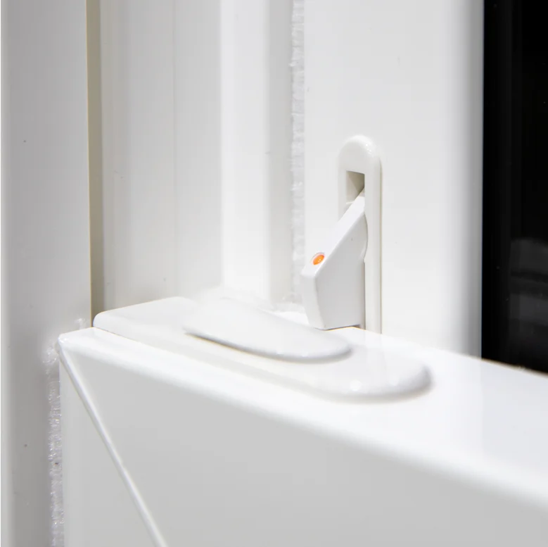 Close-up of an OKNA window latch, highlighting the clean, precise alignment and smooth finish of the hardware. The image captures the kind of small-but-critical detail most people overlook—but Window King never does. It’s a quiet showcase of the company’s obsessive attention to craftsmanship, fit, and function at every touchpoint of the installation.