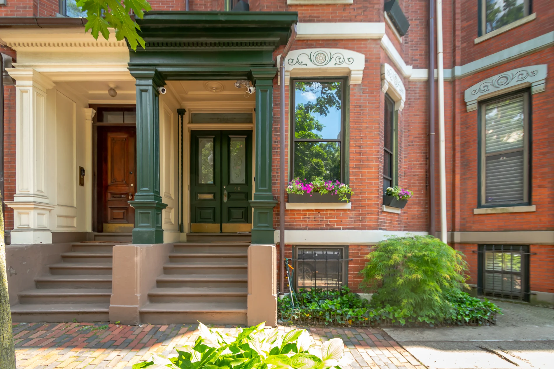 A brownstone with a new entry door.