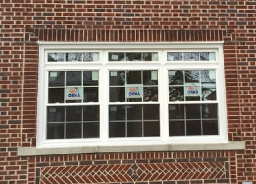 Window Replacement Project In New Rochelle, NY | Window King Finished OKNA replacement window installation with transom windows.